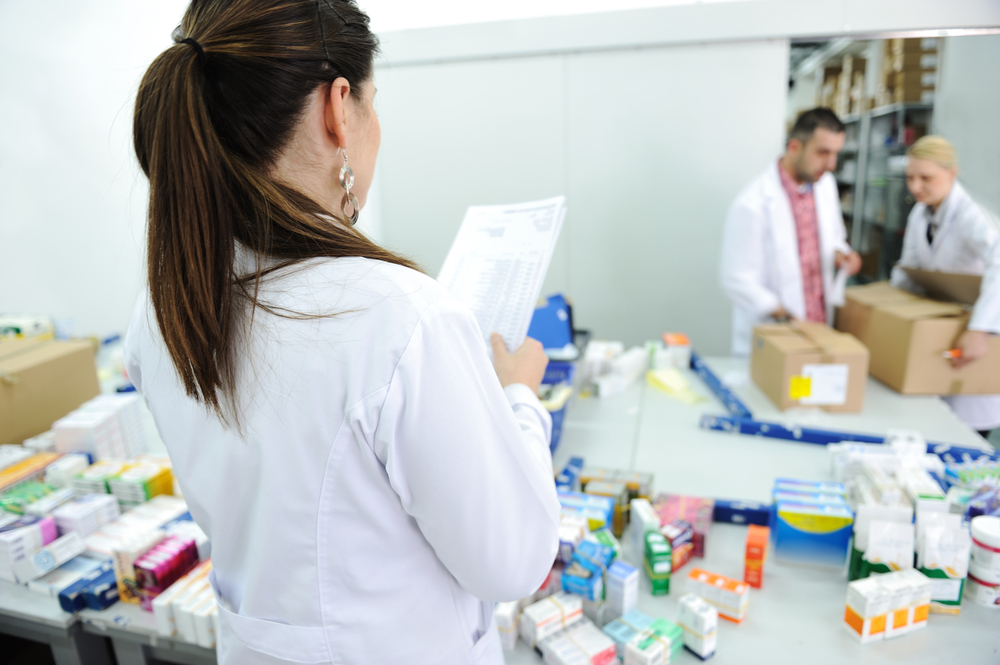 Female, surveillance and inspecting after packaging at modern factory, warehouse