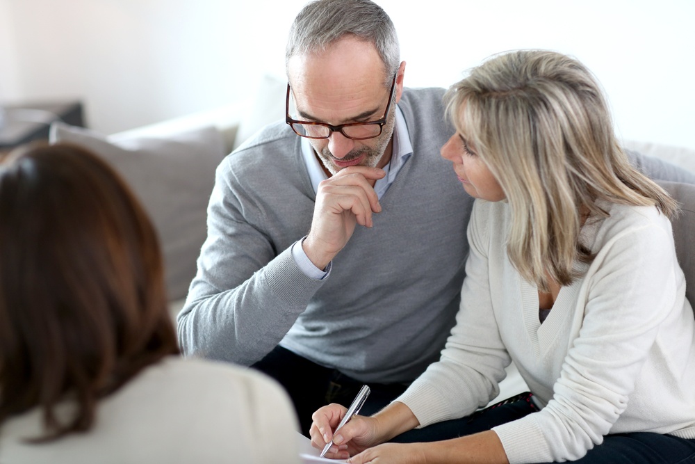 Senior couple meeting financial adviser for investment.jpeg